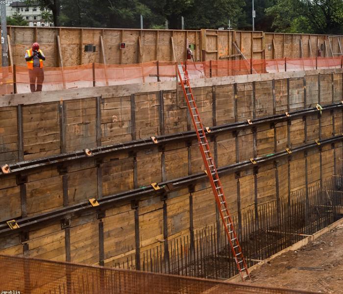 Local contractor reviewing leads on their phone